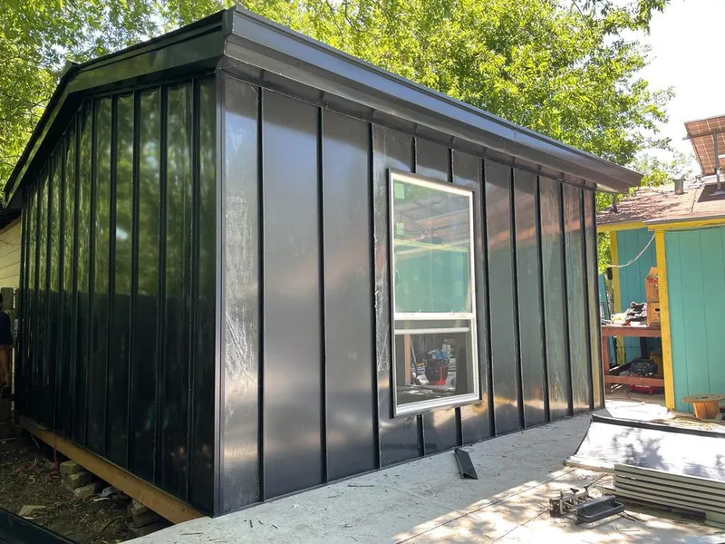 Black standing seam metal wall panels for Metal Roof Installation in Cherry Creek