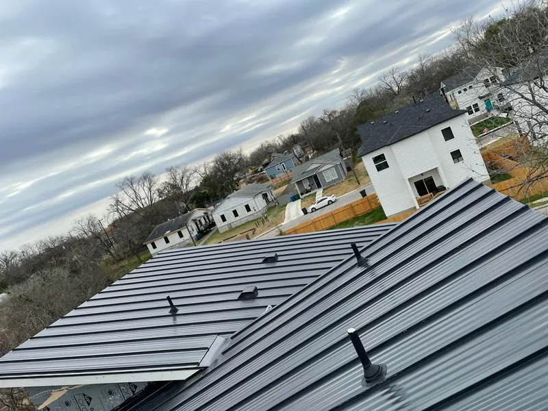 Standing seam metal roof panels with vents for Skylight Repair in Cherry Creek